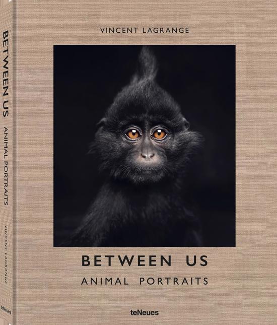 Men genel Between Us: Animal Portraits